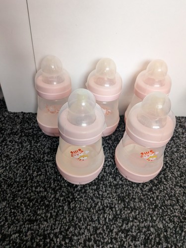 Baby girls pink mam bottles - baby,